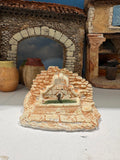 Petite fontaine avec mur